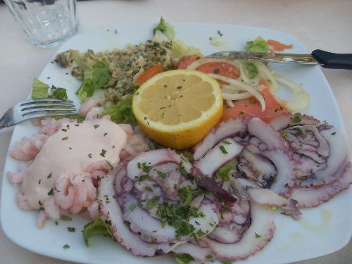 Italian Fish starter - At camping Butterfly in Peschiera Del Garda thay had a restaurant and this was our starter. It was huge and it was Delicious. Several kinds of fish, squid, Salmon, prawns. It took a while to finish. When finished we realised that we had also a main course coming which was maybe not sucha good idea since we had this big starter. It was good, please try if you are there!