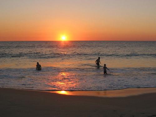 it is a sunset in the beach  - This photo was taken in beach