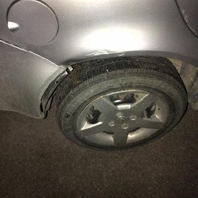 My side of my car - Doesnt look like much damge in the picture, but lot more in person.