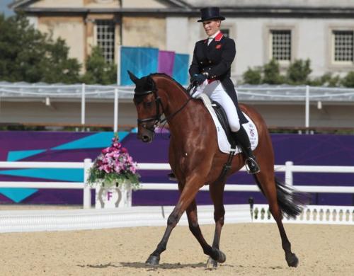 at the trot - Zara Phillips of Great britian on her horse High Kingdom performing at a trot in the dressage faze of three day eventing.