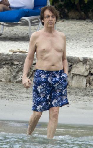 Sir Paul - Pauk McCarthney going for a swim. He looks a little pasty but other then that he looks good for 70!