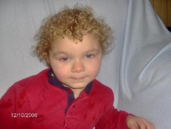 My grandson Jordyn beautiful curls - My grandson Jordyn. See his beautiful curls. This picture was taken at Christmas time.  