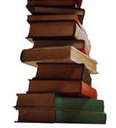 I love to read - A stack of hard cover books