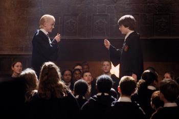 Harry Potter  - It is taken during a duel between Harry and malfoy during the second year.Harry does not know any spells but stilll steps up bravely and fights him.It indicates his bravery at all stages.He is a true Gryffindor.