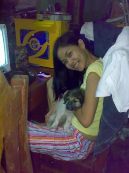 with my dog (puppy)  - taken with my puppy named lalurp at home.