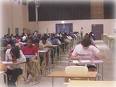 Examination - Students giving examination in examination hall.