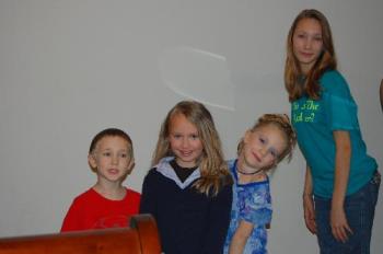click to enlarge - This is a picture of the kids that shows clearly how a flash can bounce off a wall and a person.