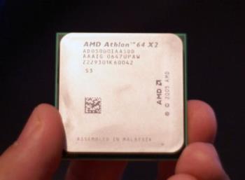  AMD Athlon 64 X2 5000+, 2.6 GHz - AMD&#039;s 65nm Athlon 64 X2 5000+ it looks just like a normal X2. Transistor count remains unchanged at 154M as there is no new functionality or cache introduced with the move to 65nm. 