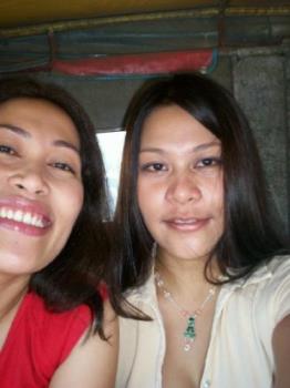 my sister in red and me... - shes 29 years old and shes the closest to my heart...