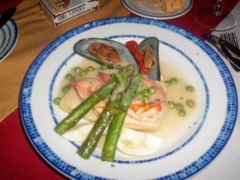 my fav meal to make - It is sea bass topped with shrimp and asparagus in a creamy wine sauce with mussels to decorate the plate.  I make this and my hubby loves it.  This was what I made for our anniversary that is why I have a picture of it