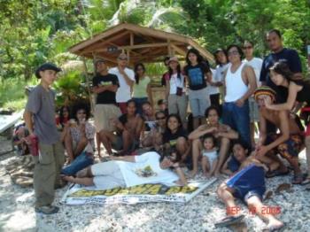 people in the beach. - well these persons inculding me were hanging out and having a good time in the beach