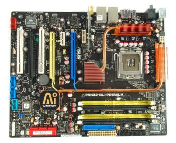 ASUS P5N32-SLI Premium (nForce 590 SLI Intel Editi - The P5N32-SLI Premium is based on the nForce 590 SLI Intel Edition, a notch higher than the nForce 570 SLI and bears more similarities towards its AMD counterpart, so much so that it actually looks very promising. The SPP core is still based on a variation of the C19 though, so it will be interesting to see what ASUS can conjure up with the board.
Let&#039;s have a look first at the full technical specifications of the P5N32-SLI Premium before we continue. As always, ASUS premium motherboard bundles pack a punch. Our board came with the following peripherals included in the box:-

# 6 x SATA data cables
# 3 x SATA power converter cables (dual plugs)
# 1 x 80-conductor Ultra ATA data cable
# 1 x 40-conductor IDE data cable
# 1 x floppy drive data cable
# 1 x SLI bridge
# IEEE 1394a port bracket
# USB 2.0 (2 ports) bracket
# WiFi-AP Solo antenna
# ASUS Array Mic set
# ASUS Q-Connector set
# Optional heat-pipe fan
# I/O shield
# Driver and support CD
# InterVideo Media Launcher Suite (OEM)
# User guide