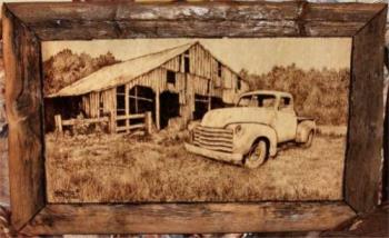 Barn and chevy truck - This is a picture of my father in laws art work. Burned into natural wood free handed. No inks or pencil ever used. He is wonderful.
