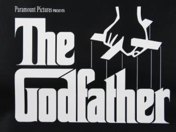 Godfather - The movie representing Don Corleonne family.The life and story of a gangster .