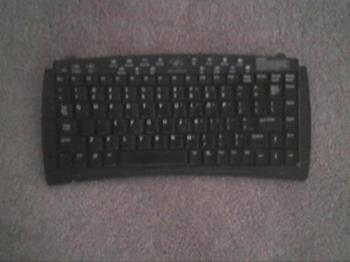 Wireless keyboard - Here is the wireless keyboard that I use at home and it works well. You just need to replace the batteries from time to time. You also have to program it according to the instructions and then you are all set to go.