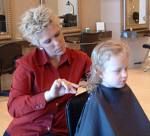 Hair cut. - A kid having its regular.