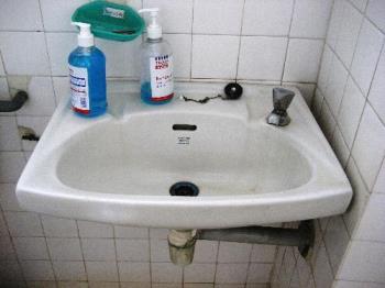 Tap. - A wash basin.