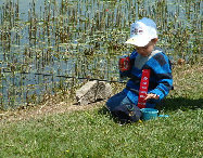 Kids Fishing Derby - Isn&#039;t this kid cute with his 2nd place ribbon for the fishing derby. Kids love fishing it can be a great learning experience for them.