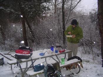 Cooking while camping - the dog wants whatever falls to the floor!