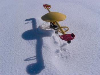 snow teeter totter - a playground toy waiting for kids..