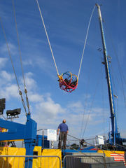 The reverse bungee ride. Popular at fun fairs acro - The reverse bungee ride. Popular at fun fairs across the world. The reverse bungee ride. Popular at fun fairs acro - The reverse bungee ride. Popular at fun fairs across the world.