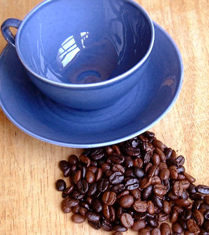 Coffee - Blue Coffee Cup and coffee seeds