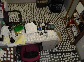 Office prank - Good clean fun.
Ingredients:
1 office cubical
2000 paper cups
several gallons of water
Directions:
Fill cups half full of water. Place on every available flat surface at one inch intervels. Take lots of pictures.
Enjoy co-worker reaction.