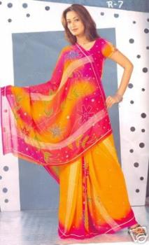 Saree clad model - Saree&#039;s made at Kanchi becomes more demand in western countries. On line saree sales also improved much.