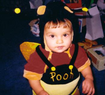 Matthew on the day the took his first step - Matthew on the day the took his first step, I am sure the winnie the pooh outfit help him stand up