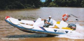 Boating - Man driving a speed boat