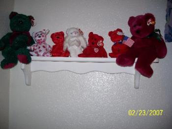 A shelf of Beanies - Here is a small shelf of my beanies and their kin the buddies. It is a small portion of the ones that I have. :)