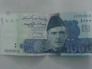 Pak 1000 Rupees - The front look of new design of Pakistany 1000 Ruppes note that is equal to USD16.55 in total.