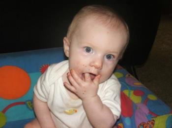 Vegemite on Toast! - This is my daughter at about 8 1/2 months old enjoying her breakfast of Vegemite on Toast!
