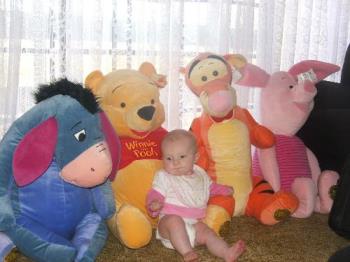 Giant toys - This is my daughter sitting with her giant Pooh toys, she sat still & was quiet so better than i take them myself to save money!