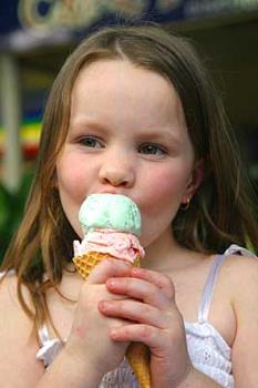 Mmm, Ice Cream - Little girl eating an ice cream cone