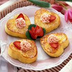 French Toast with Strawberry Butter - Serve this French toast made with Italian bread topped with flavored butter -- a perfect way to say "I love you."

