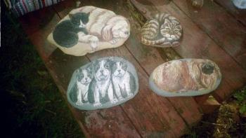 my "pet rocks" - I like to paint animals on rocks. Here are some of the ones I have done.