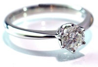 white gold ring - this is a white gold engagement ring. i like its look a lot and this is my fav. one.