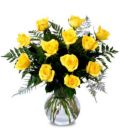 Yellow Roses - image of an arrangement of yellow roses in a crystal vase.