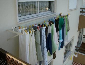 My Apartment Clothesline - photo of the exterior clothesline attached to the apartment building which I use to hang out washing.