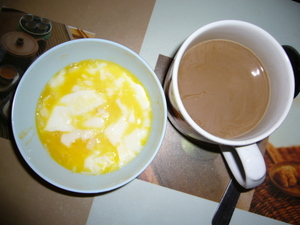 Half-boiled eggs and coffee - My breakfast - two half boiled eggs and a cup of coffee