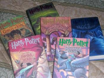 Harry Potter Books - This is a complete set of the Harry Potter Books by JK Rawlings...except the last one..which I am anxiously awaiting on the be released on July 21.