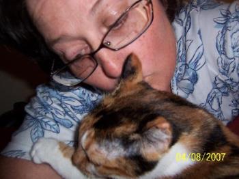 Me with my loving Abigail.  - Abigail is loving me and my glasses are falling off my nose as ususal. When I get involved with loving my pets I forget my glasses fall off my face.