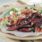 teriyaki steak - 2 pounds beef skirt steak 
4 cloves garlic, minced 
2 cups teriyaki sauce 

Cut the skirt steak into individual strips for serving. Add the garlic to the teriyaki sauce. In a re-sealable plastic bag, combine the steak and the sauce. Seal tightly and refrigerate to marinate overnight. 
Preheat oven to broil OR preheat a barbecue grill. 
When oven OR grill is ready, remove meat from bag and discard remaining marinade. Place meat on a broiler pan for the oven OR directly on the grill for the barbecue. Cook for about 5 minutes per side, or to desired doneness. 
