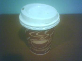 Coffee - a hot cup of take away coffee