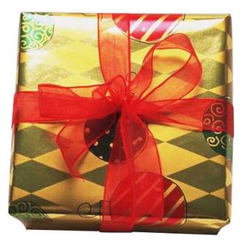 Present With A Pretty Red Bow - This is a photo of a present wrapped with a pretty red bow on top of it...the contrast between the wrapping and the bow makes the red stand out so brightly.