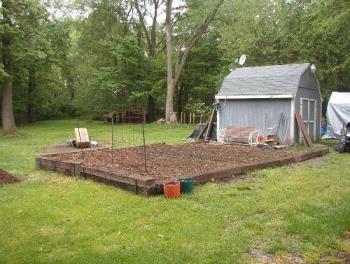 New garden not quite finished - This is where I moved my garden to after dealing with flooding every year where I used to have my garden. I wasn&#039;t done with it when I took this pic but it&#039;s all planted now and already producing green beans. 