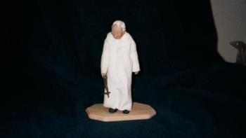 Clay scuplture of Pope Paul - I love working with polymer clay and did this sculpture from a picture I saw of the Pope walking in his garden.