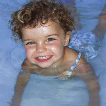 Love to stay in the water - This photo depicts a little girl who loves to stay in water all the time...she thinks she is part fish...LOL Love to stay in the water - This photo depicts a little girl who loves to stay in water all the time...she thinks she is part fish...LOL