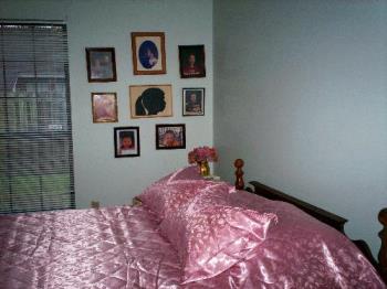 Right half - Family photos on the wall